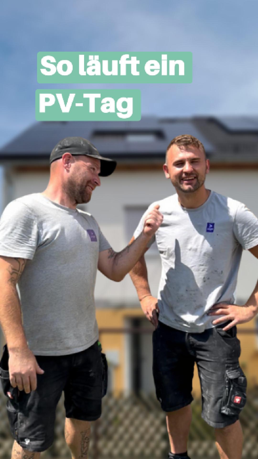 Ivan und Maik stehen vor PV Anlage auf Dach